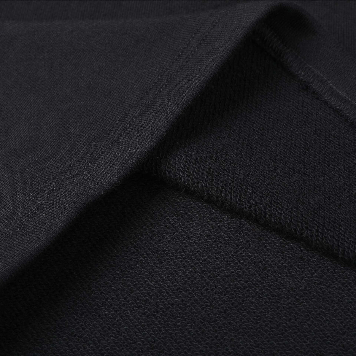 Calcas cortas de algodón para hombres en color negro, con ajuste holgado y cordón de cierre.