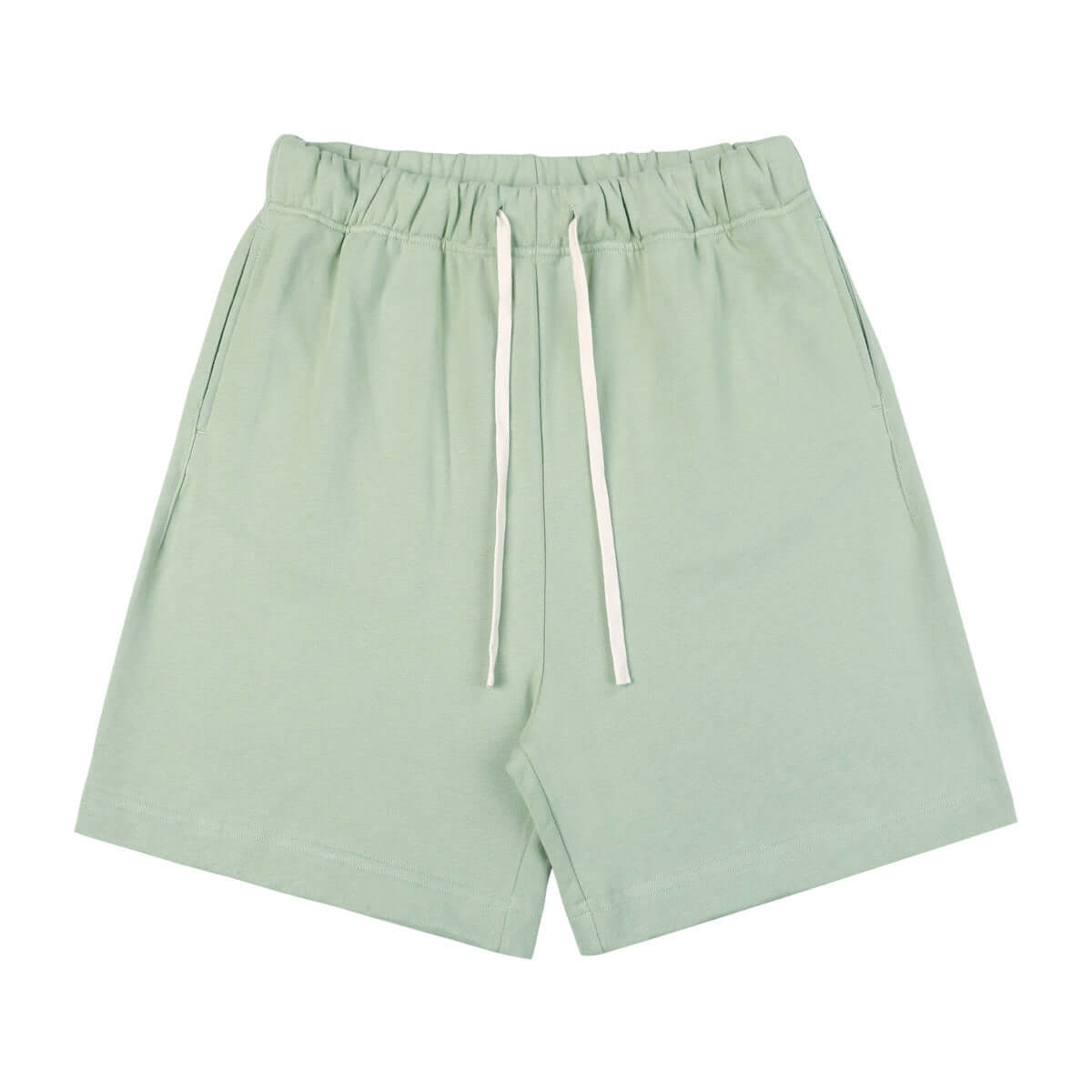 calcas cortas de algodón para hombres en color verde claro con cordón ajustable y ajuste holgado.